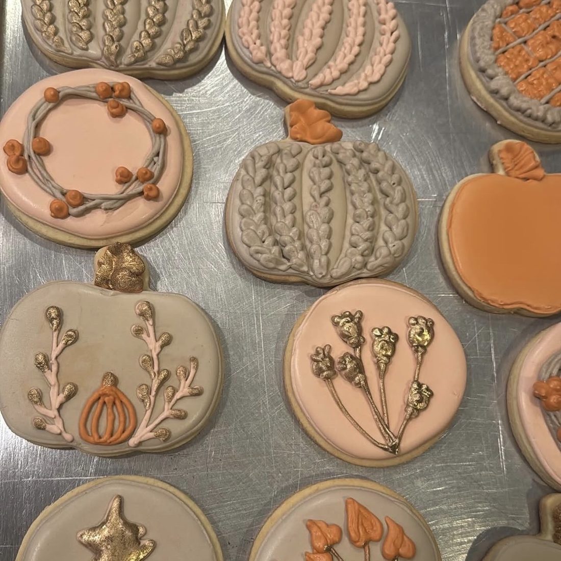 Hand-piped pumpkin and botanical sugar cookies